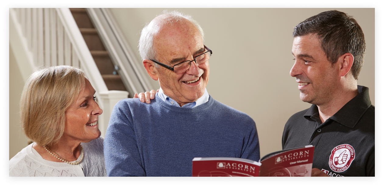acorn stairlift customer being helped