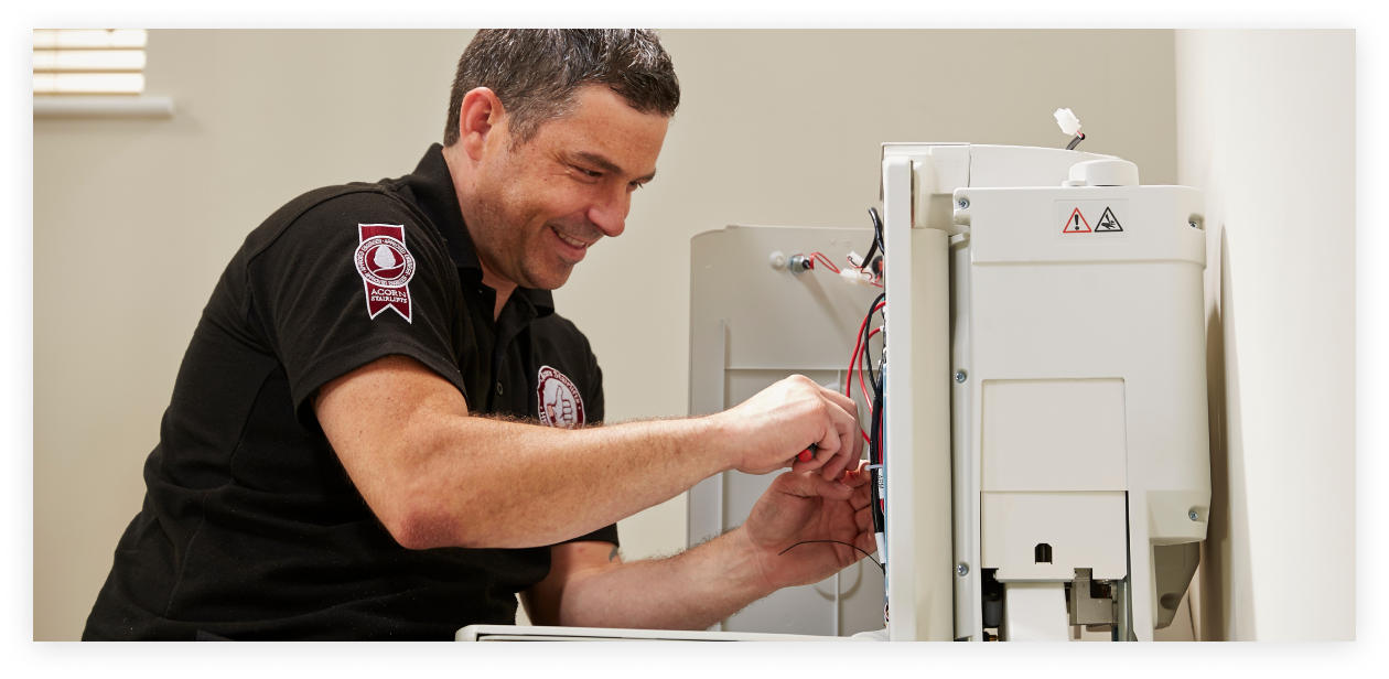 Acorn engineer fixing stairlift